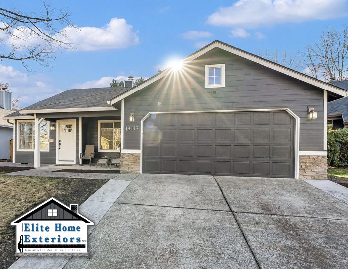 Modern James Hardie Siding house with gray exterior and driveway